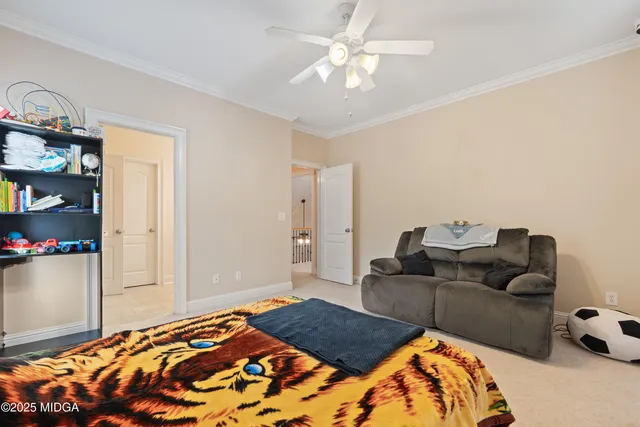 a kitchen with a table chairs refrigerator and cabinets
