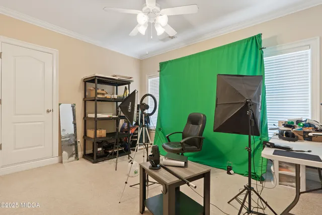 a kitchen with white cabinets and white stainless steel appliances