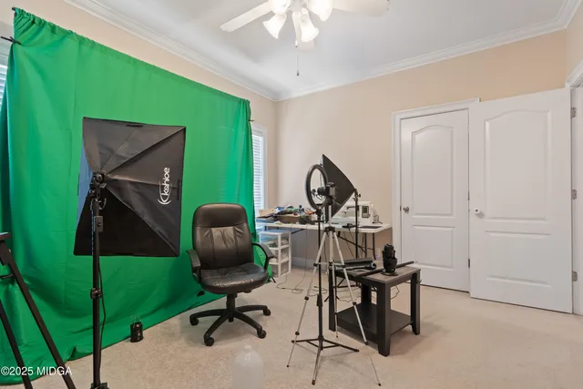 a view of a workspace with furniture