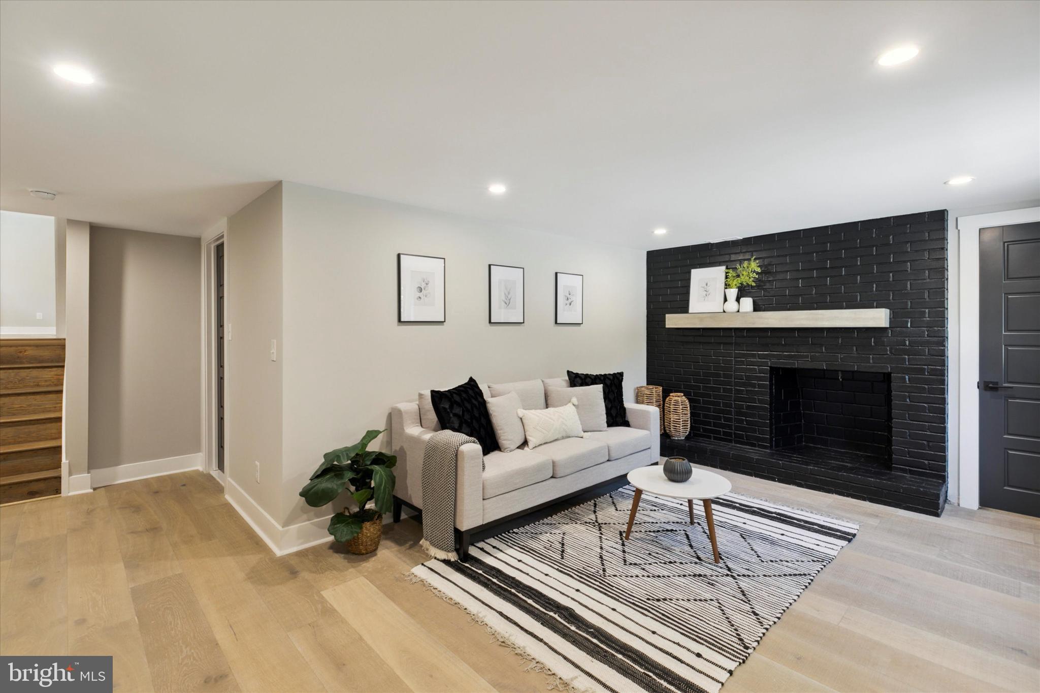 1110 West Valley Road Wayne, PA 19087 - Photo 54 of 91 Downstairs Living Room with Accent Wall