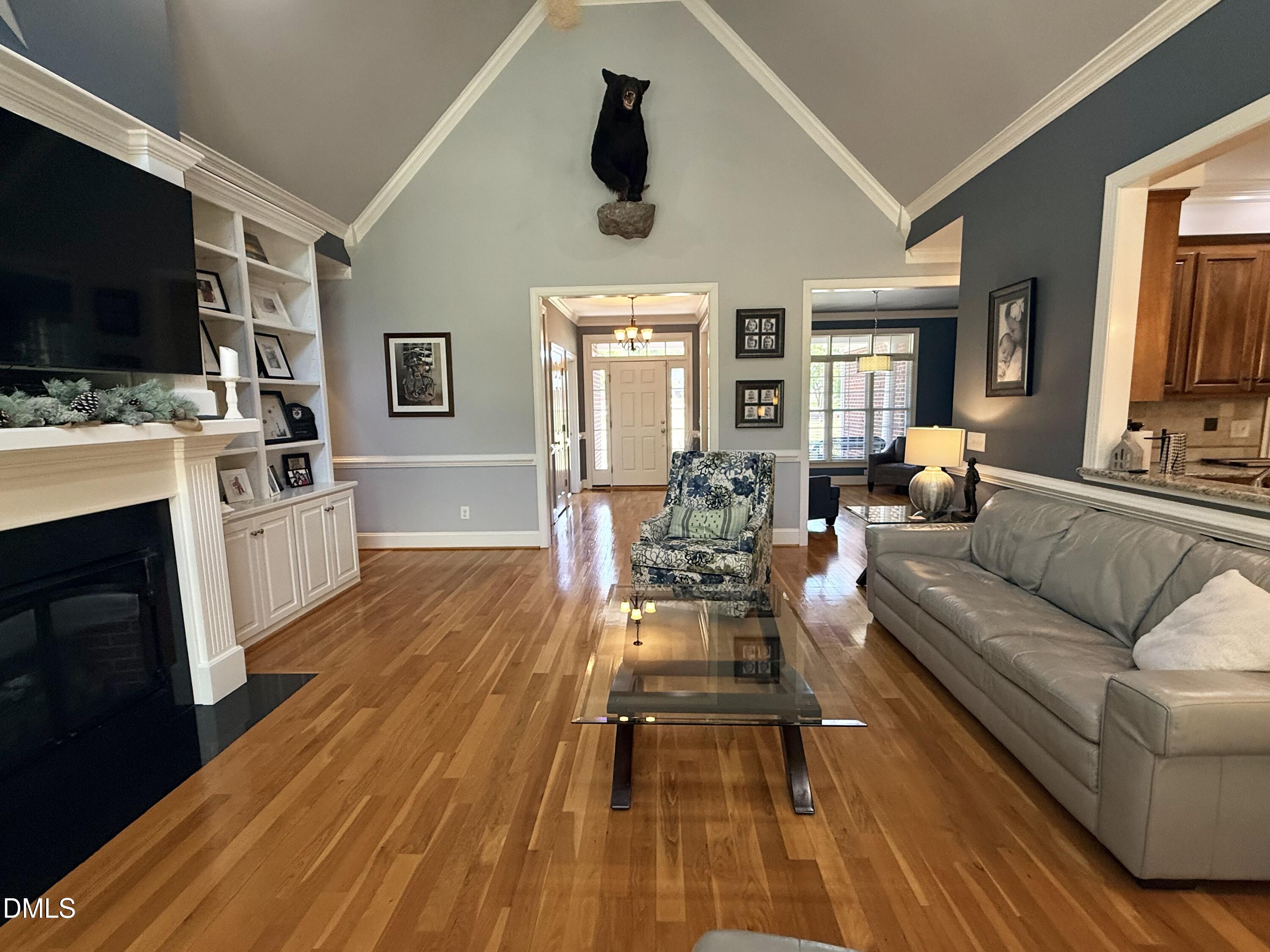 217 Clearwater Drive Roxboro, NC 27574 - Photo 11 of 57 a living room with furniture and a flat screen tv
