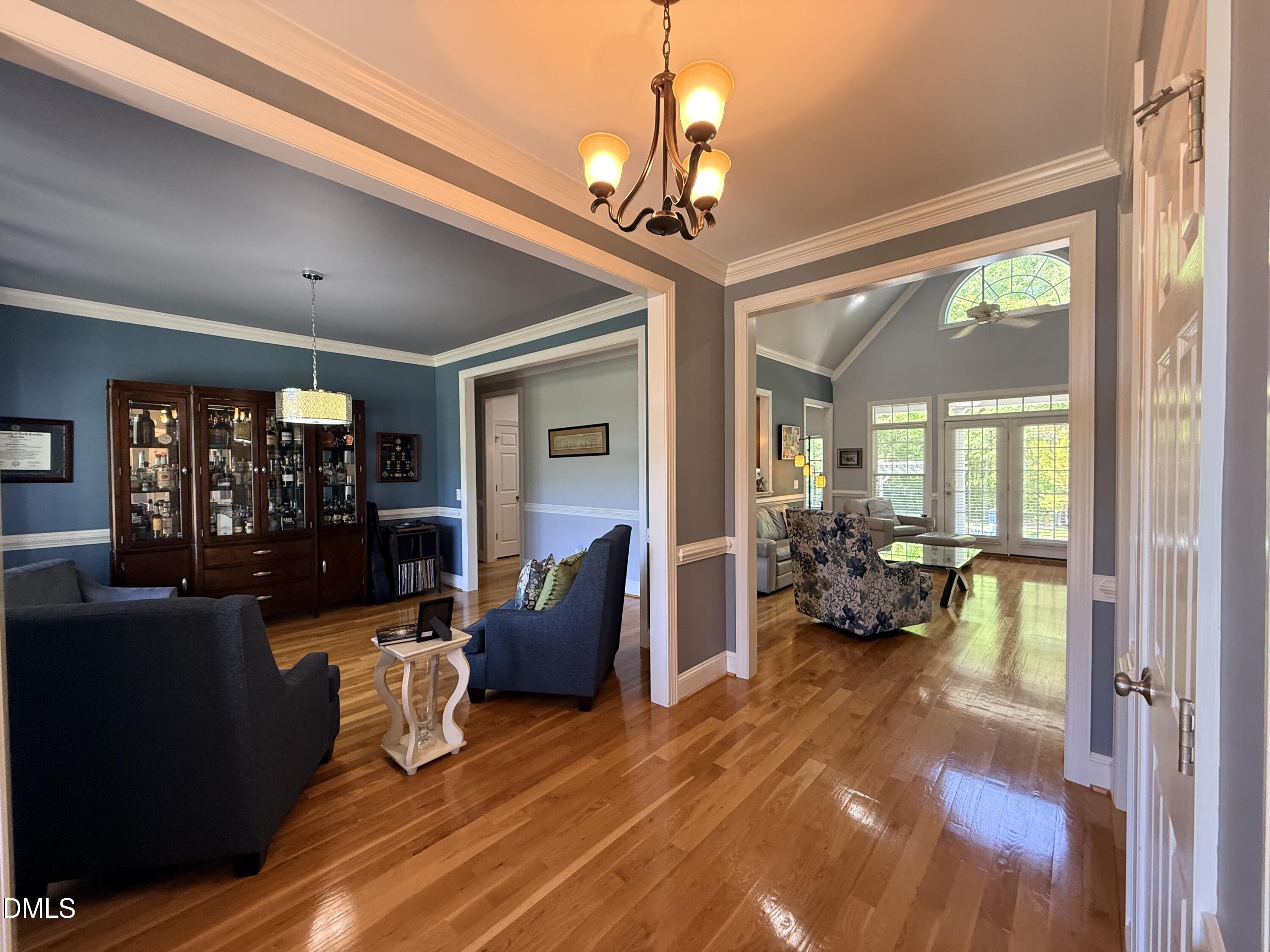 217 Clearwater Drive Roxboro, NC 27574 - Photo 14 of 57 a living room with furniture dining table and a large window