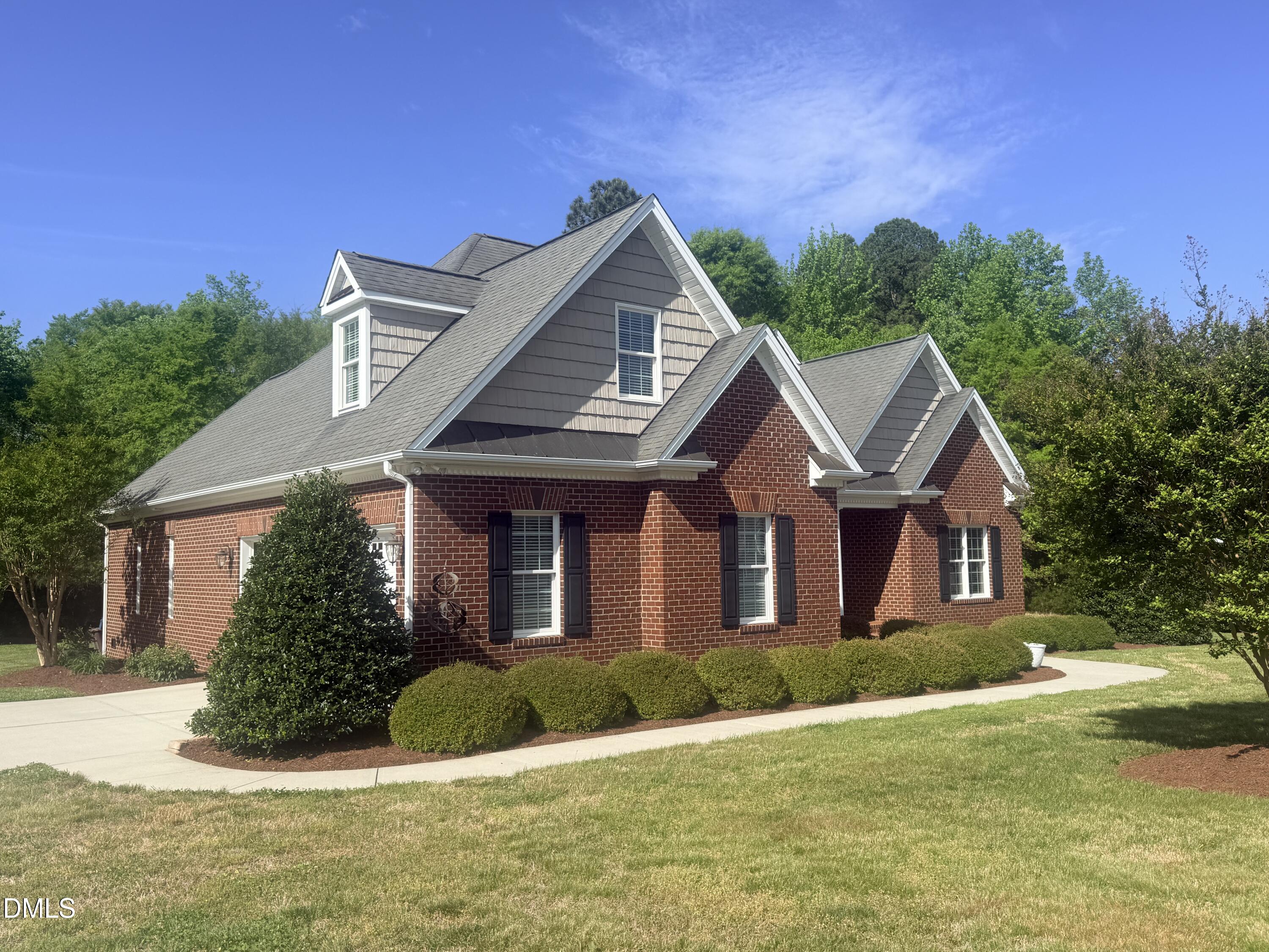 217 Clearwater Drive Roxboro, NC 27574 - Photo 2 of 57 a front view of a house with a yard