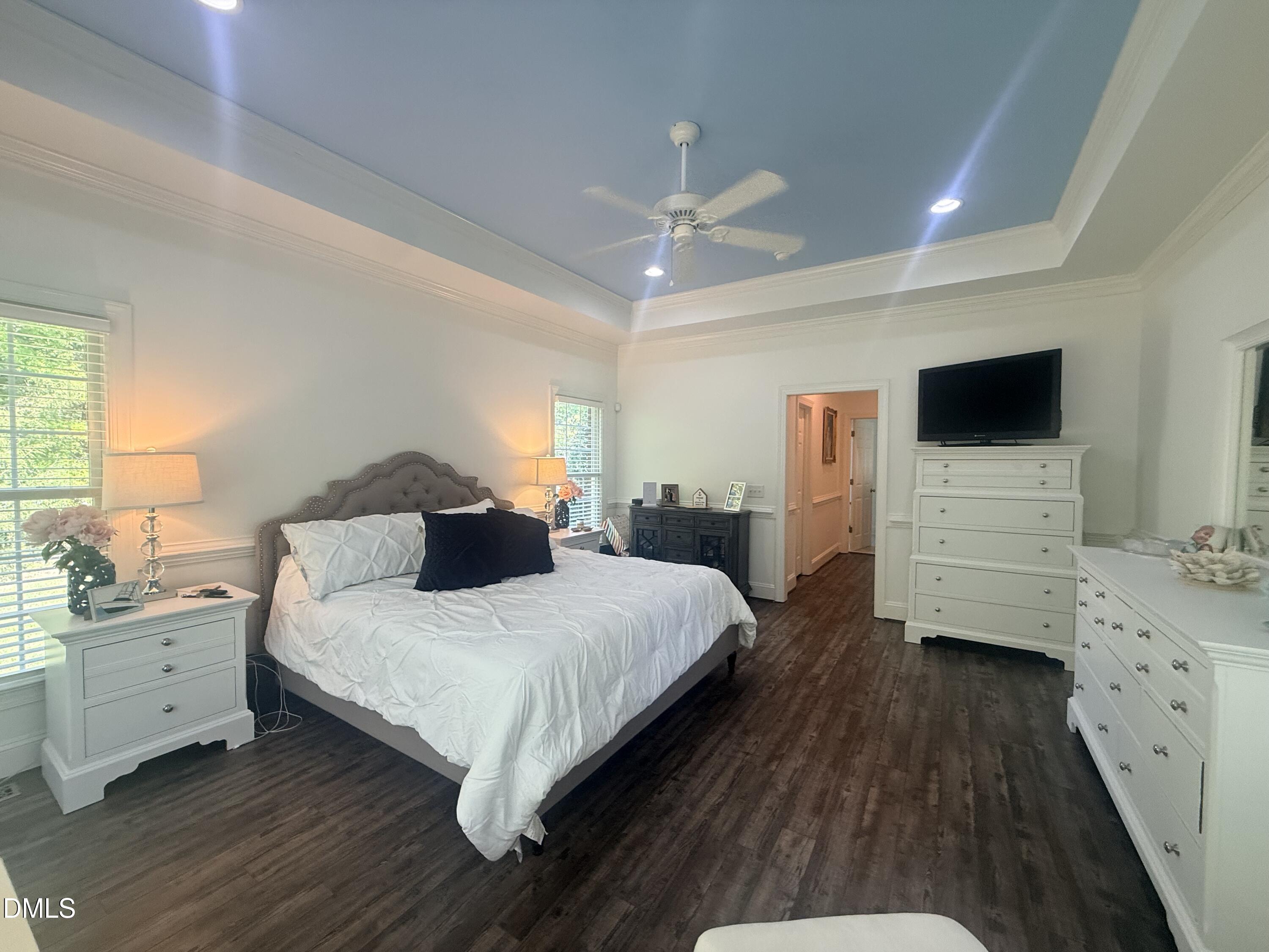 217 Clearwater Drive Roxboro, NC 27574 - Photo 28 of 57 a bedroom with a bed and a flat screen tv