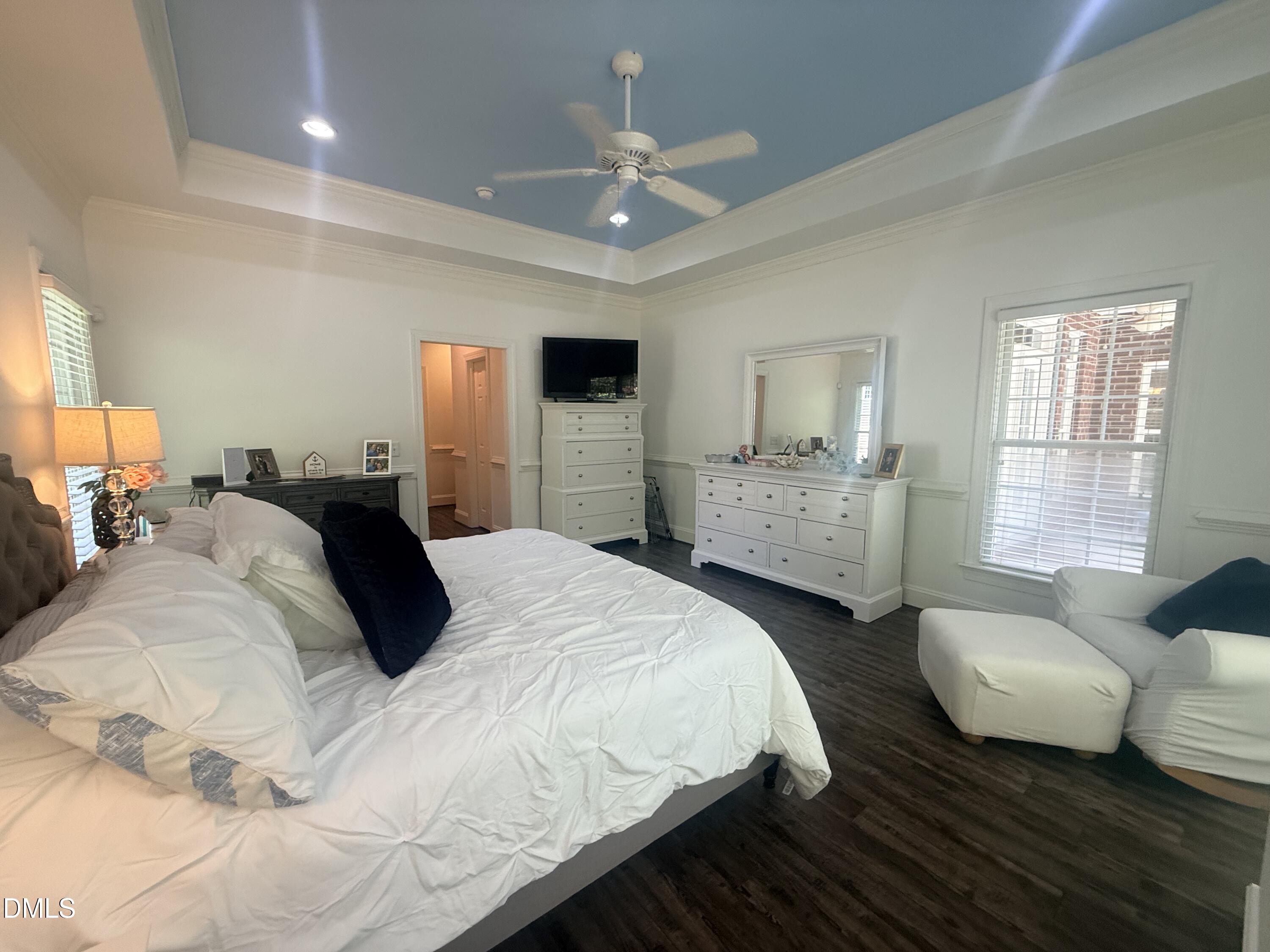 217 Clearwater Drive Roxboro, NC 27574 - Photo 30 of 57 a spacious bedroom with a bed and wooden floor