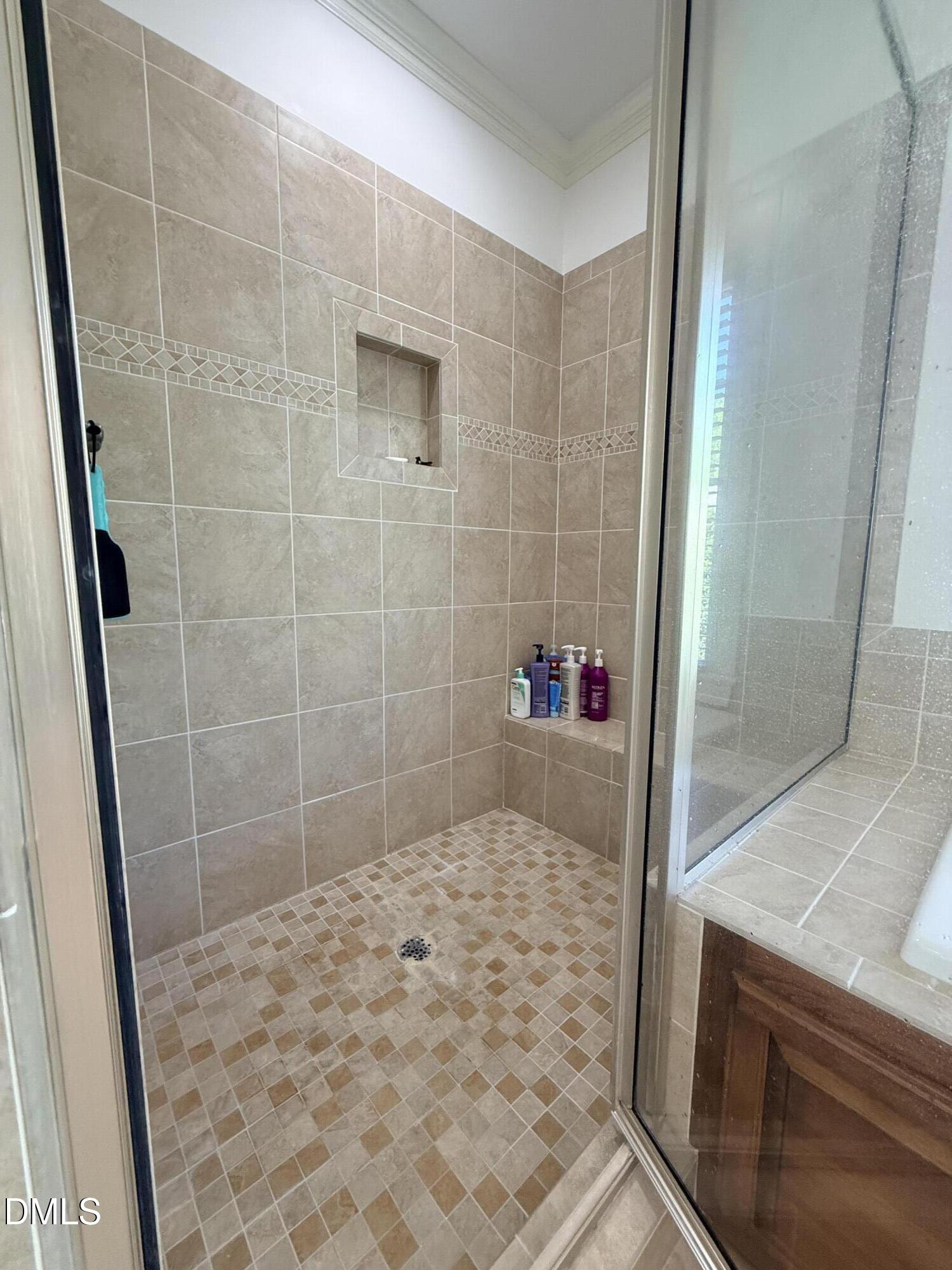 217 Clearwater Drive Roxboro, NC 27574 - Photo 36 of 57 a bathroom with a sink and a shower