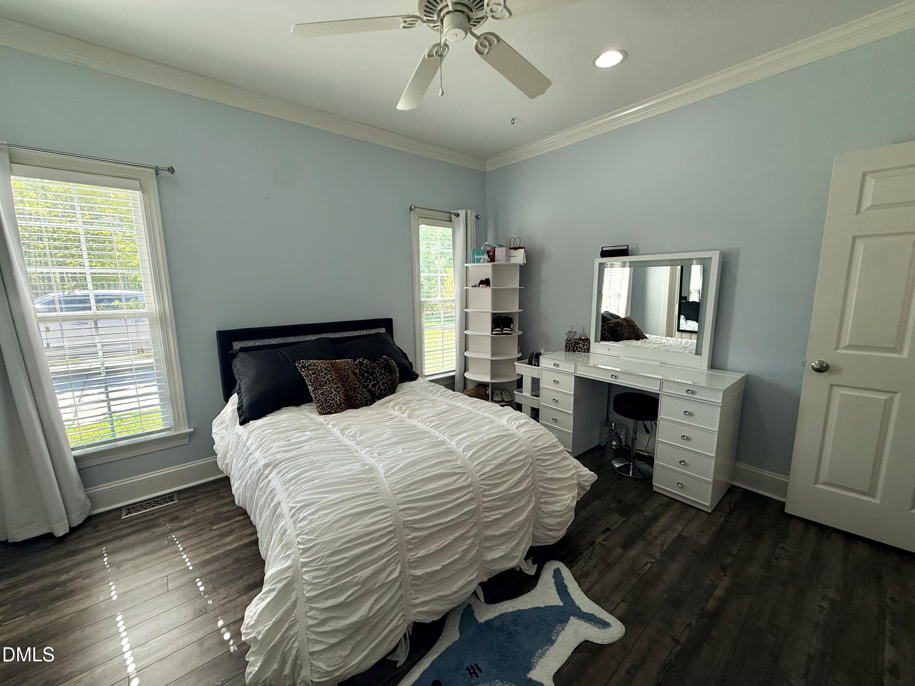 217 Clearwater Drive Roxboro, NC 27574 - Photo 43 of 57 a bedroom with a bed and a fireplace