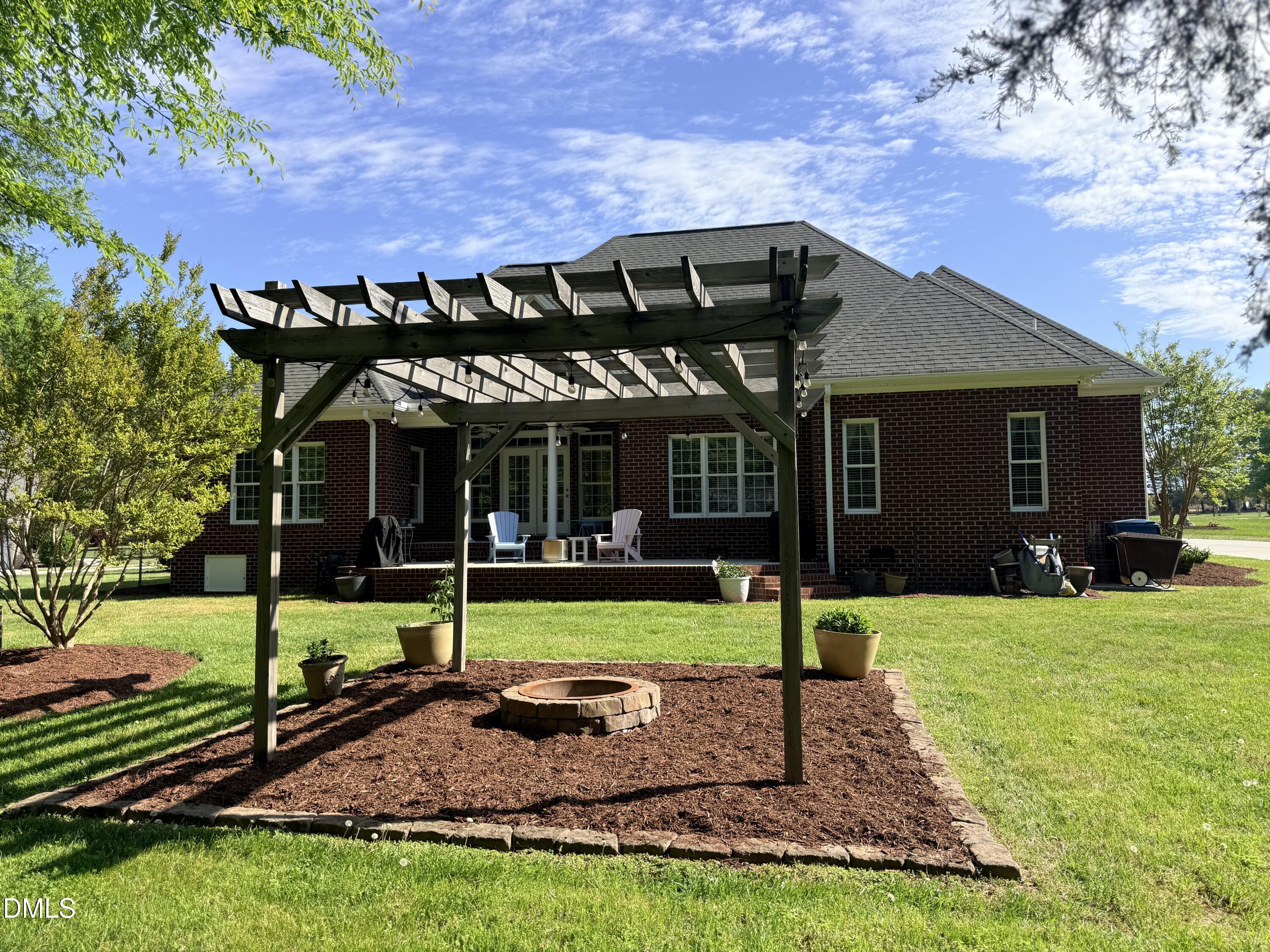 217 Clearwater Drive Roxboro, NC 27574 - Photo 49 of 57 a view of a house with backyard and porch
