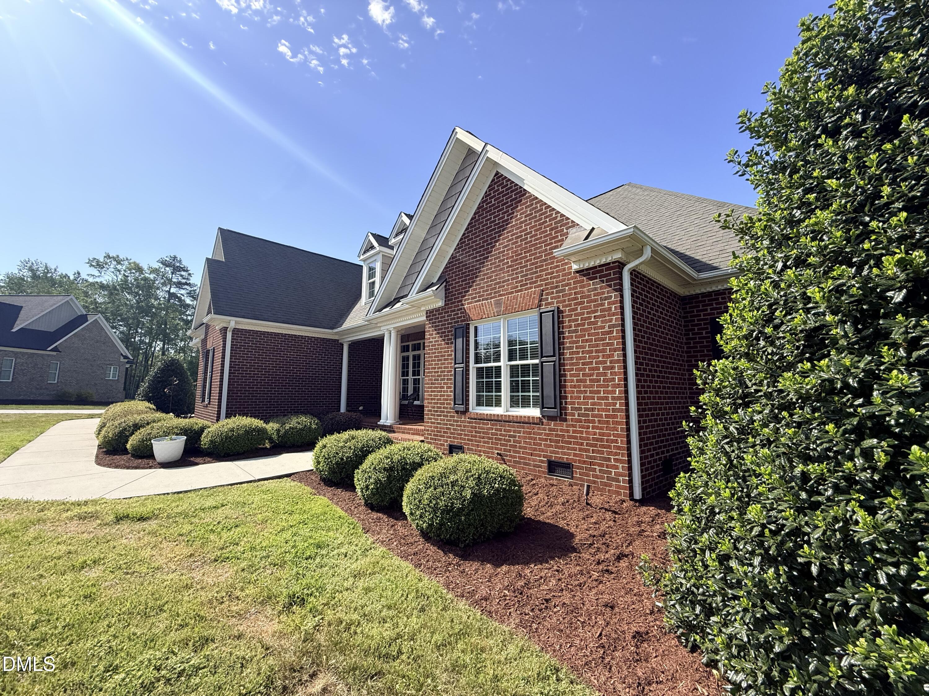 217 Clearwater Drive Roxboro, NC 27574 - Photo 56 of 57 a front view of a house with garden