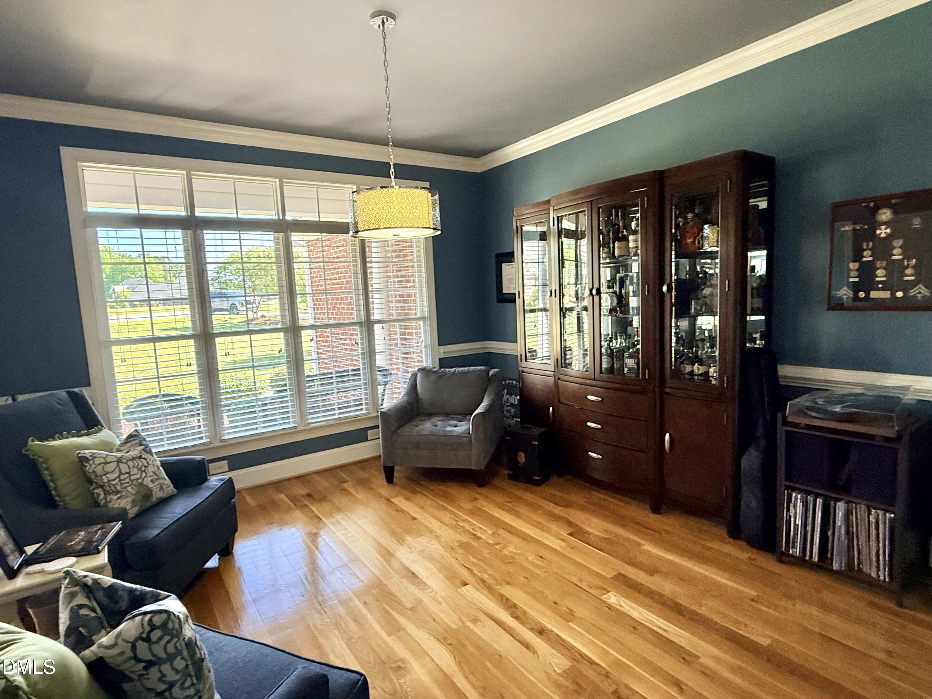 217 Clearwater Drive Roxboro, NC 27574 - Photo 7 of 57 a bedroom with furniture and large windows