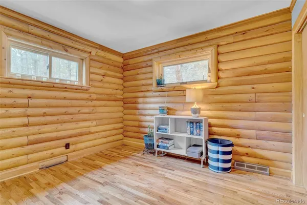 a view of a chairs in a room