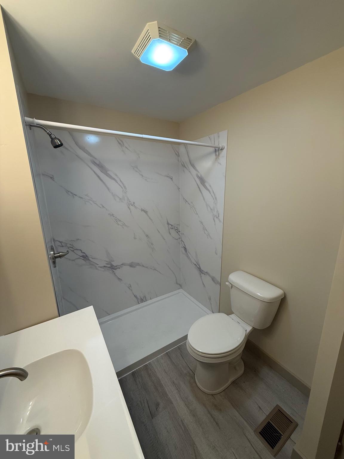 9505 Main Street Huntingdon, PA 16652 - Photo 22 of 72 a bathroom with a toilet and a sink