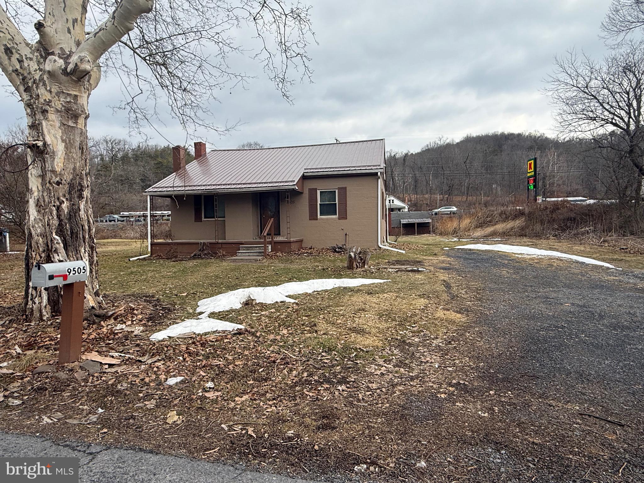 9505 Main Street Huntingdon, PA 16652 - Photo 4 of 72 a view of a house with a yard