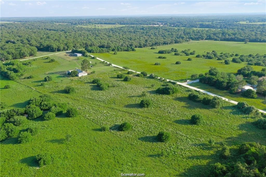 9776 Calhoun Road Bryan, TX 77808 - Photo 47 of 50 a view of a green field with an ocean