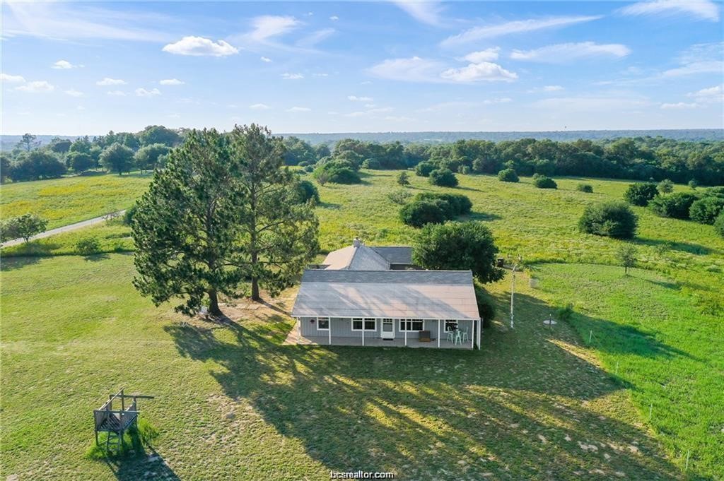 9776 Calhoun Road Bryan, TX 77808 - Photo 50 of 50 a view of a lake in middle of the town