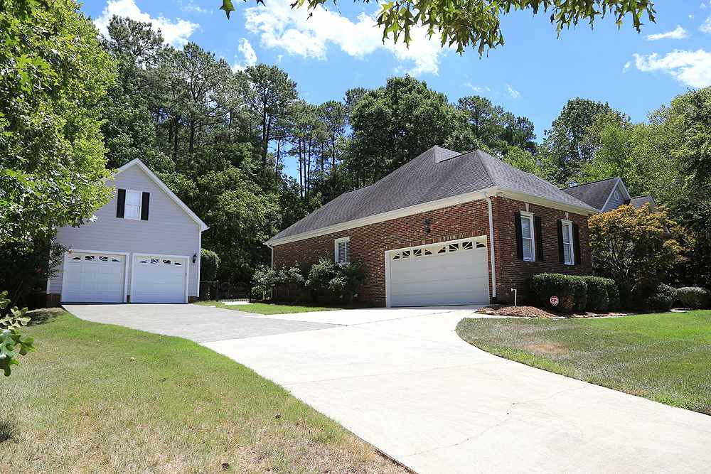 5800 Valley Mist Court Raleigh, NC 27613 - Photo 3 of 30 2 car side entry garage & 2 car detached garage 4 Car Garage