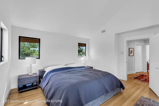 a view of a balcony with lake view and a city view
