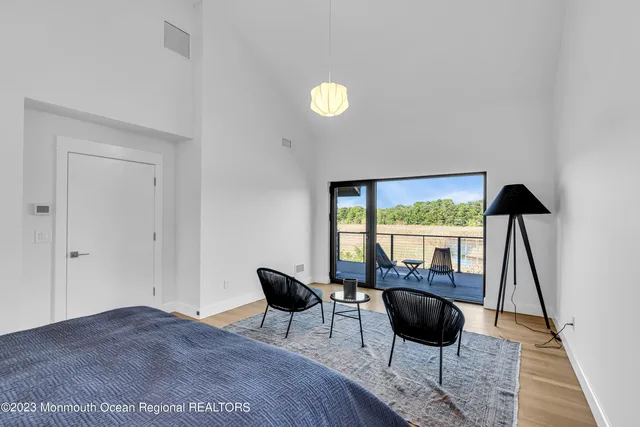 a view of a balcony with lake view and mountain view