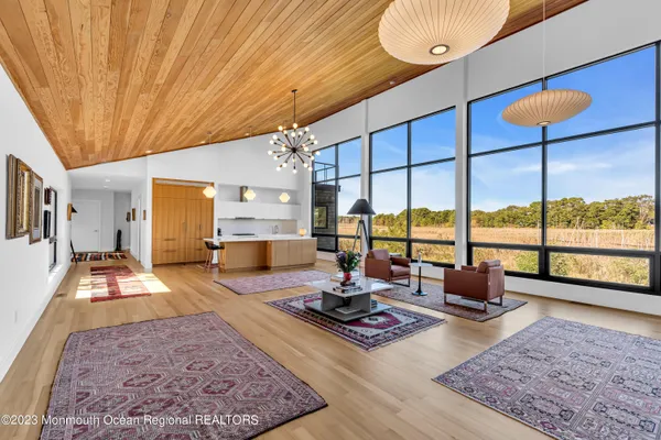 a living room with couch and a table