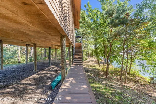 a view of a backyard with trees