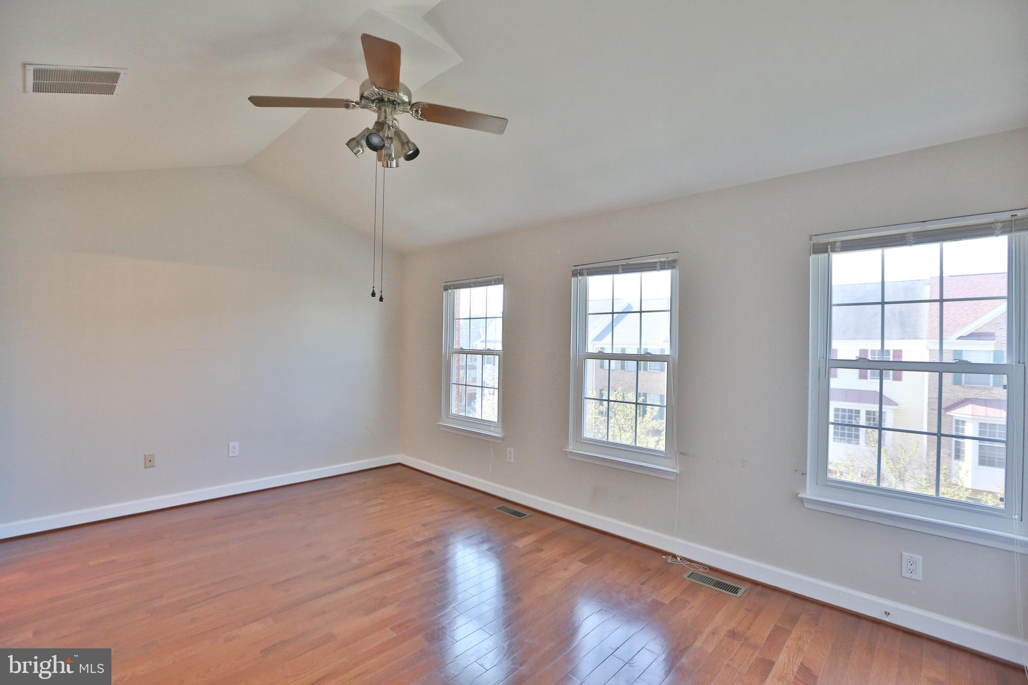 14214 Beddingfield Way Centreville, VA 20121 - Photo 13 of 19 a view of an empty room with a window