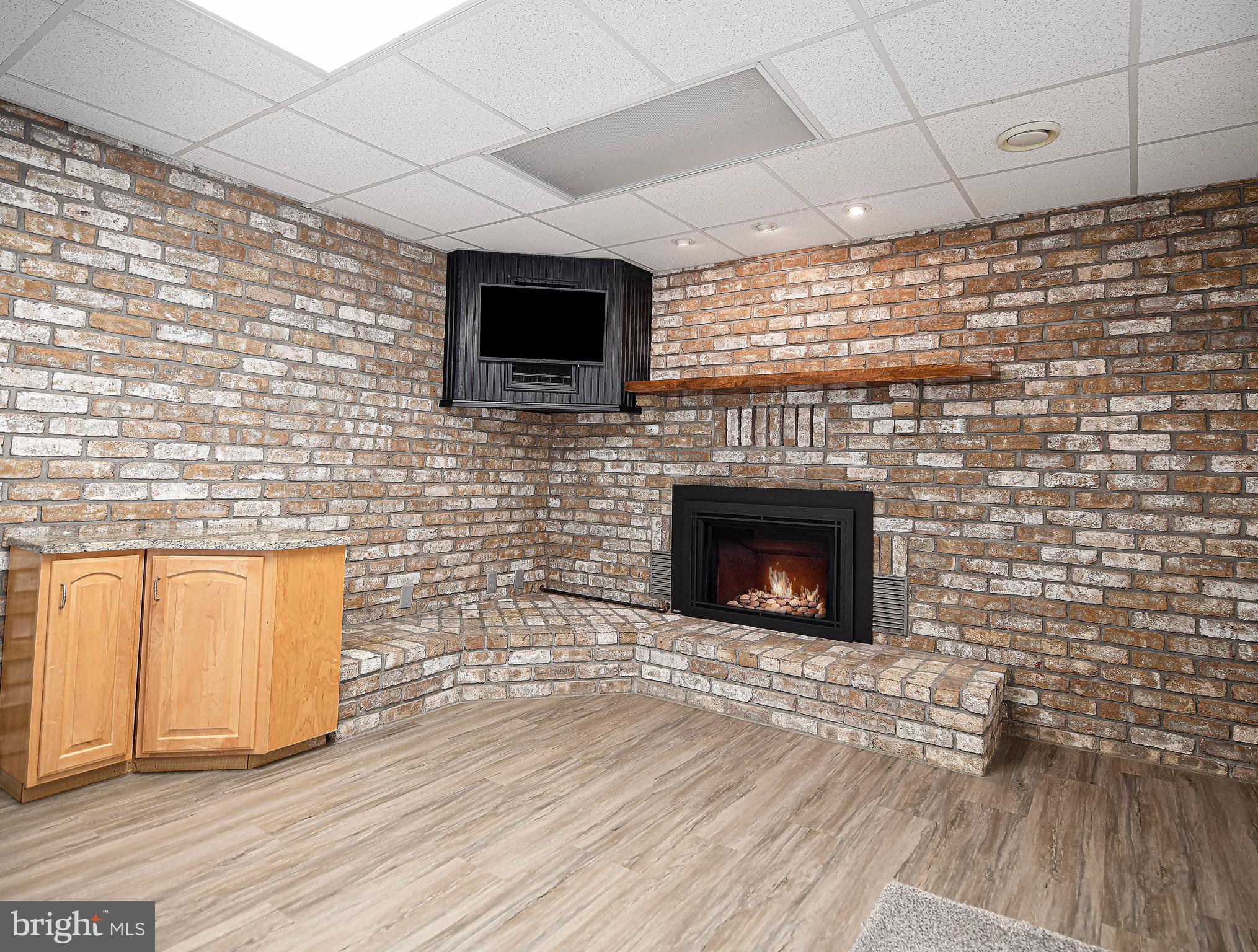 3607 Lord Baltimore Way Monkton, MD 21111 - Photo 36 of 60 Lower level family room w/wood burning fireplace