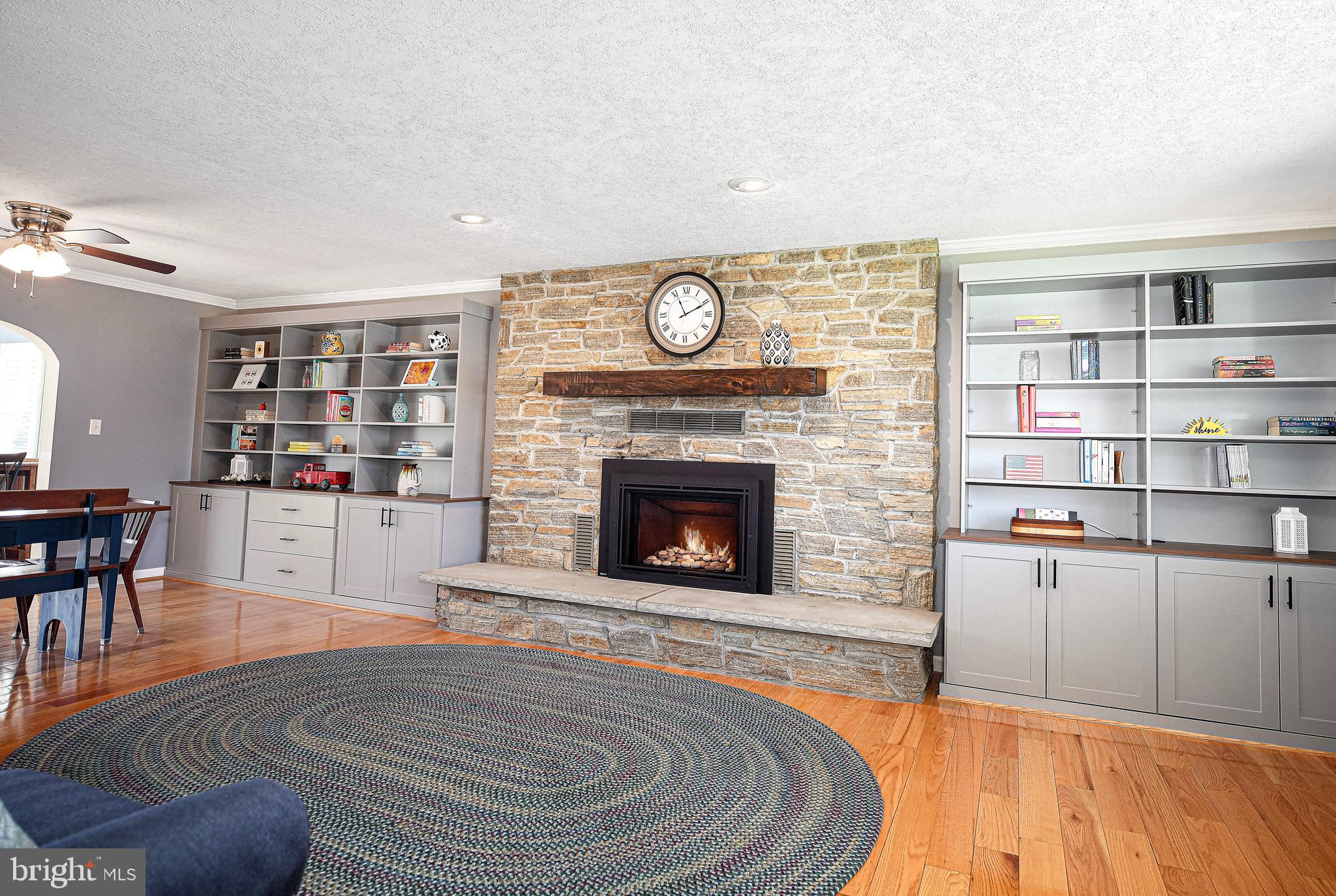 3607 Lord Baltimore Way Monkton, MD 21111 - Photo 9 of 60 Living room w/wood burning fireplace & stone wall