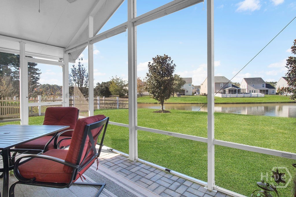 153 Hamilton Grove Drive Pooler, GA 31322 - Photo 2 of 38 Screened Patio with lagoon view