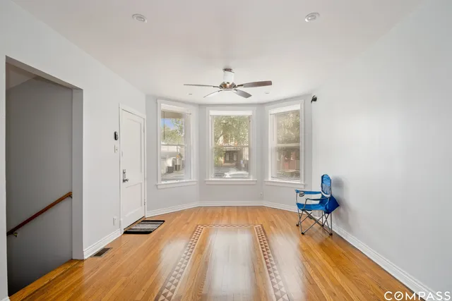 a room with a bed and a window