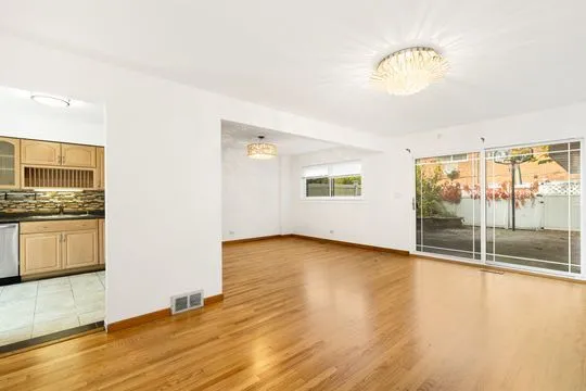 a view of an empty room and window