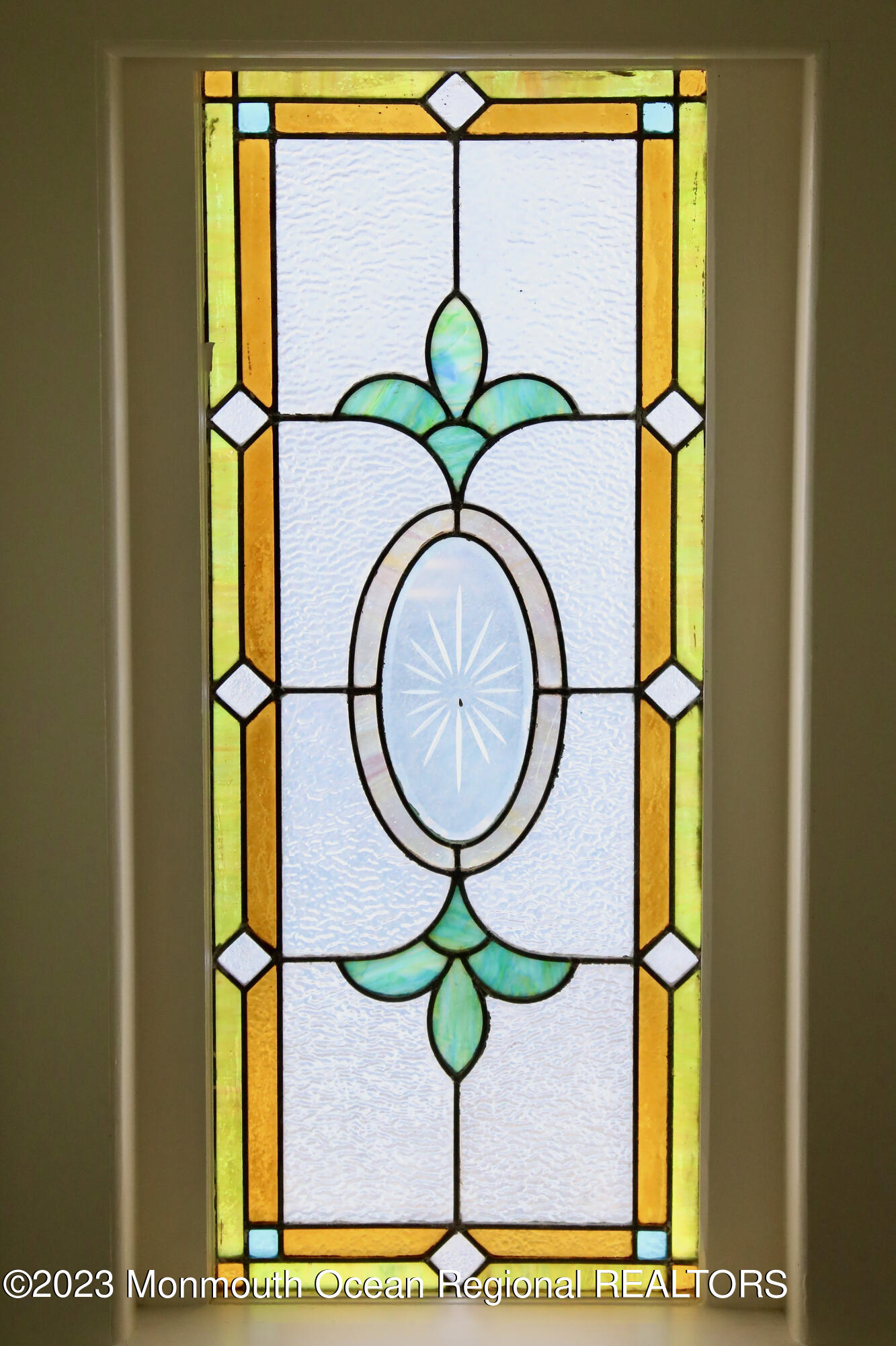 38 Ocean Pathway Ocean Grove, NJ 07756 - Photo 13 of 32 a picture of a glass door with a glass door and a window