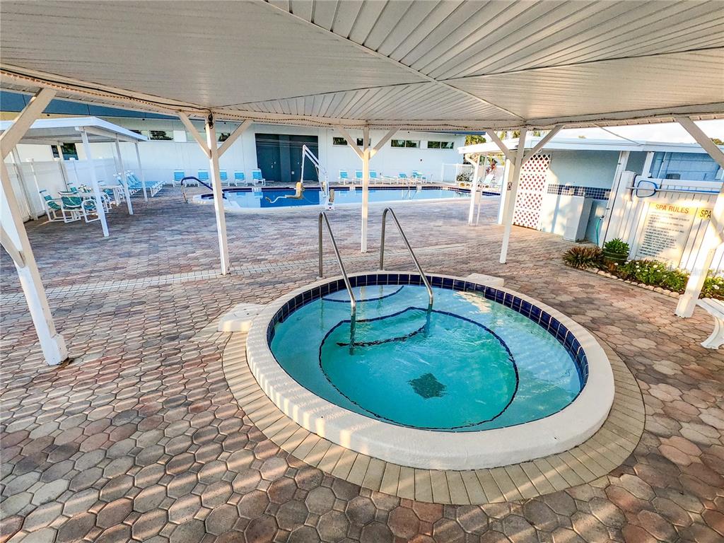 1100 South Belcher Road, Unit 100 Largo, FL 33771 - Photo 39 of 56 a view of a swimming pool with a patio