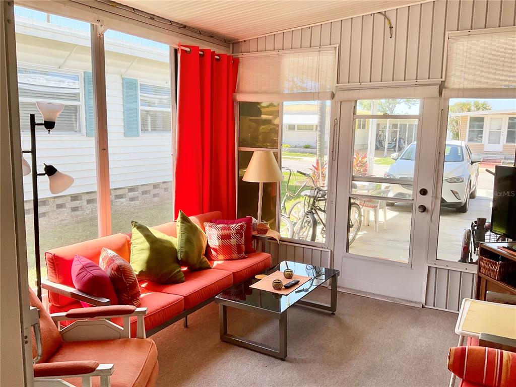 1100 South Belcher Road, Unit 100 Largo, FL 33771 - Photo 6 of 56 a living room with furniture