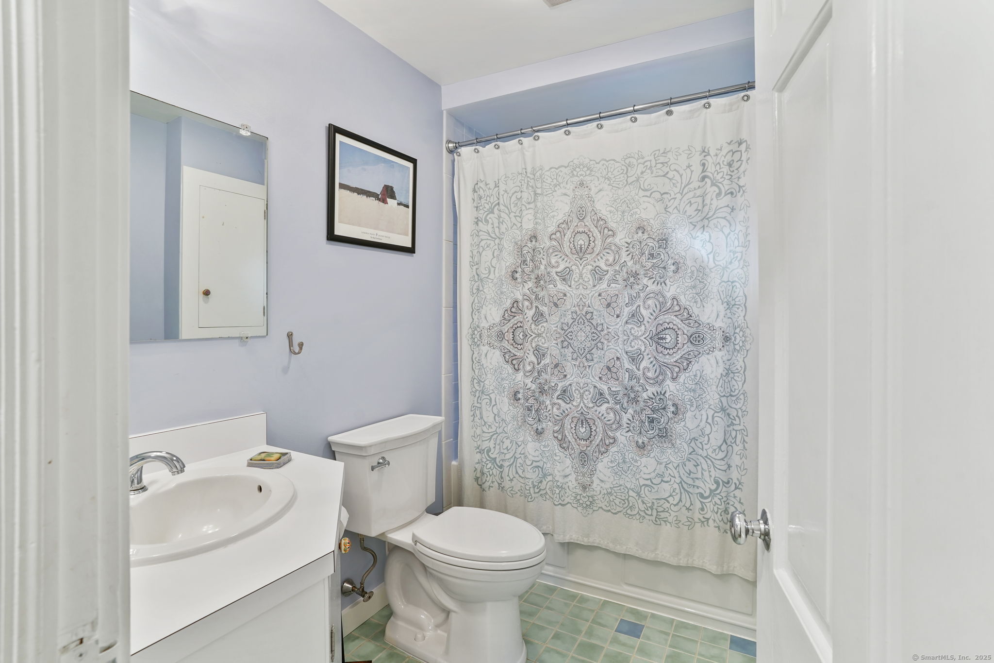 477 Newtown Turnpike Redding, CT 06896 - Photo 15 of 38 a white toilet sitting next to a bathroom sink