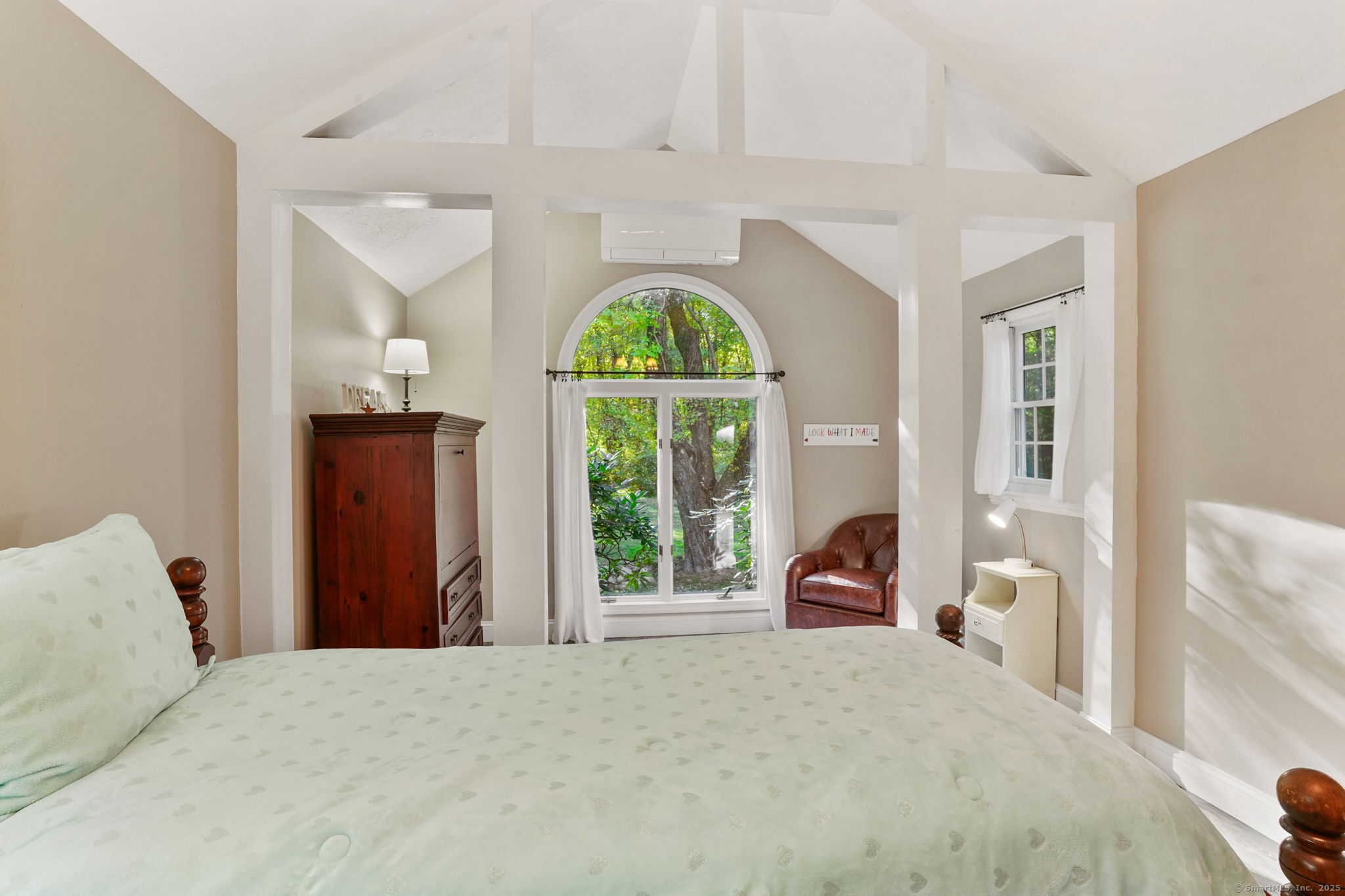 477 Newtown Turnpike Redding, CT 06896 - Photo 18 of 38 a bedroom with a bed and a window