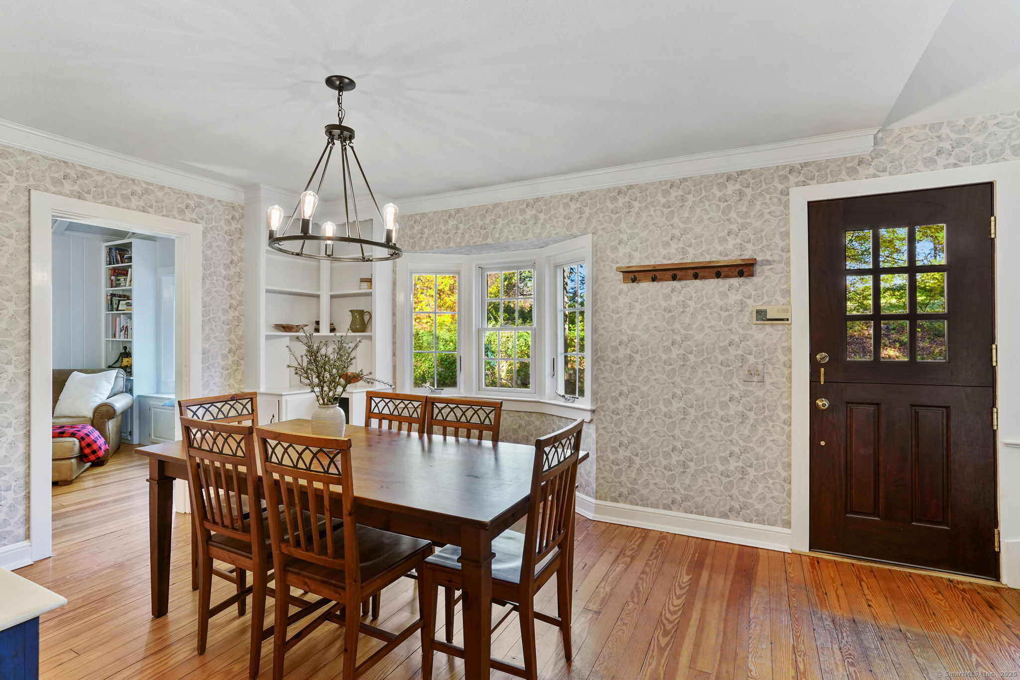 477 Newtown Turnpike Redding, CT 06896 - Photo 2 of 38 a view of a dining room with furniture window and wooden floor