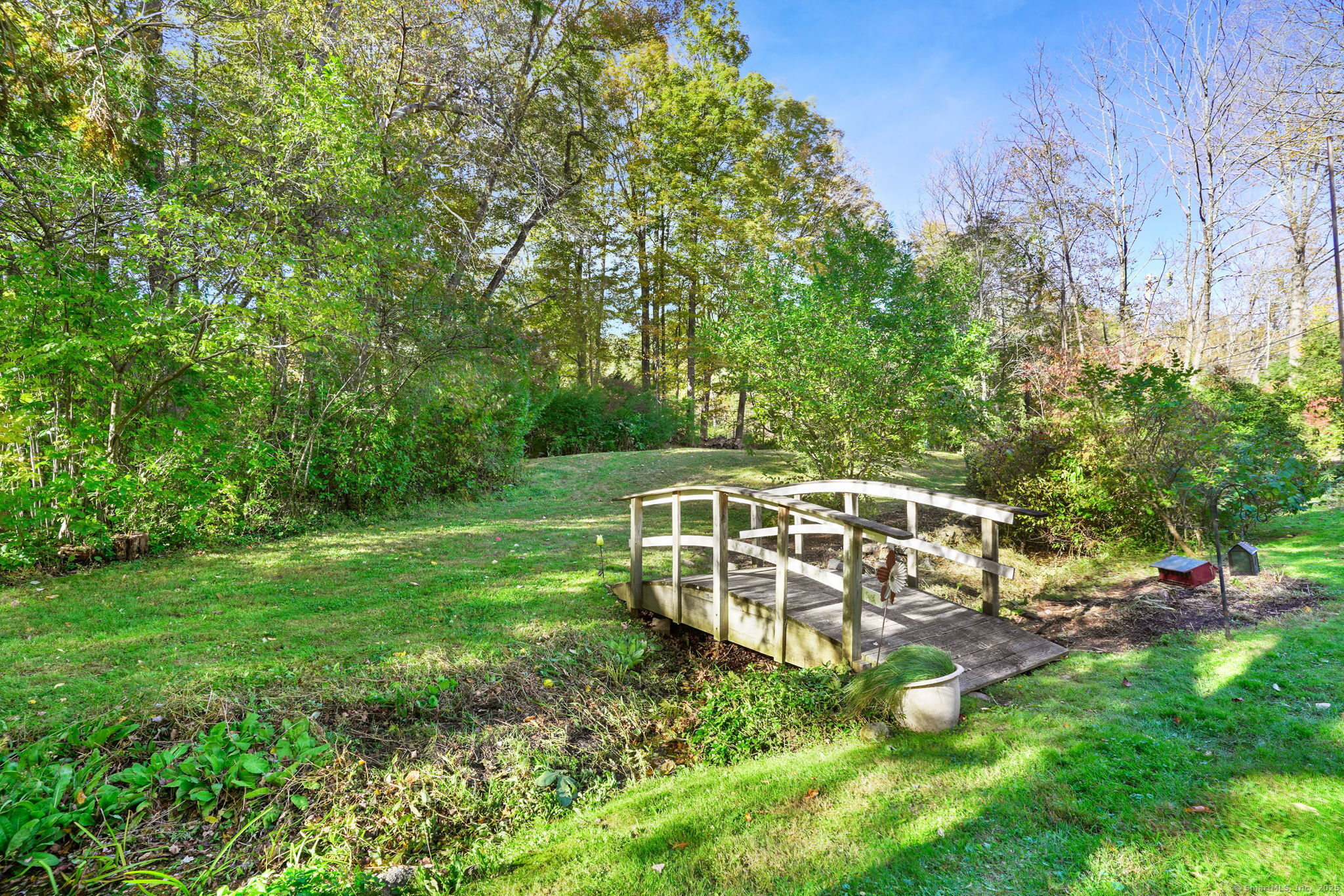 477 Newtown Turnpike Redding, CT 06896 - Photo 30 of 38 a view of a house with a backyard