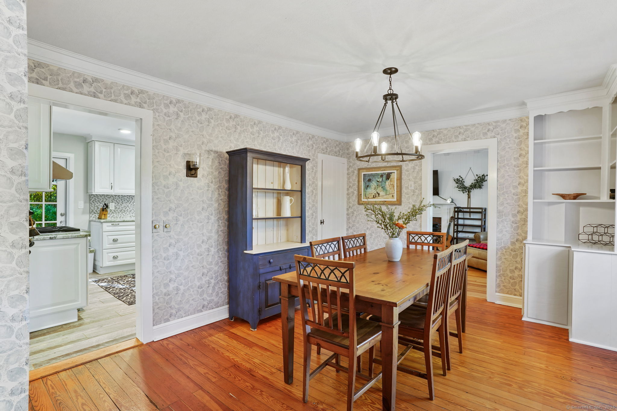 477 Newtown Turnpike Redding, CT 06896 - Photo 3 of 38 a view of a dining room with furniture window and wooden floor