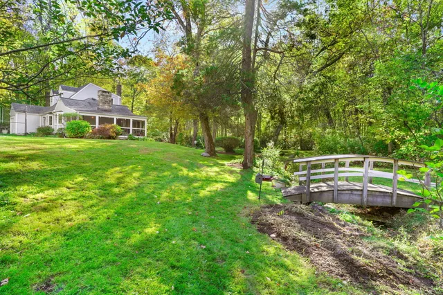 a backyard of a house with seating space