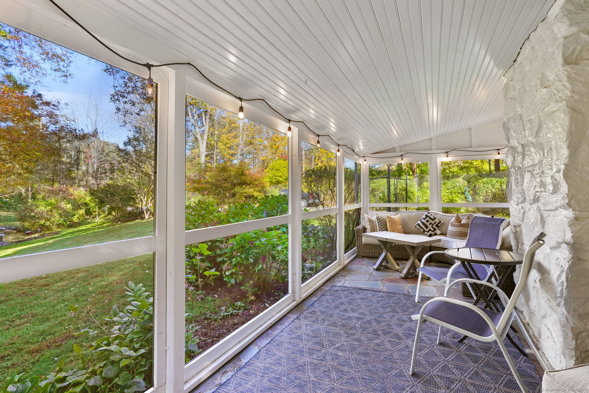 477 Newtown Turnpike Redding, CT 06896 - Photo 7 of 38 a work room with large glass windows and table