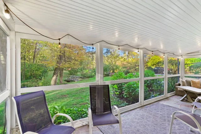 a house view with a seating space and garden view