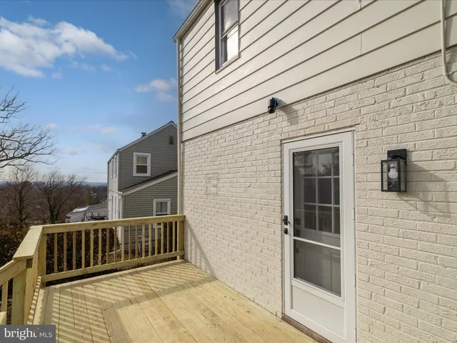 a front view of a house with a patio