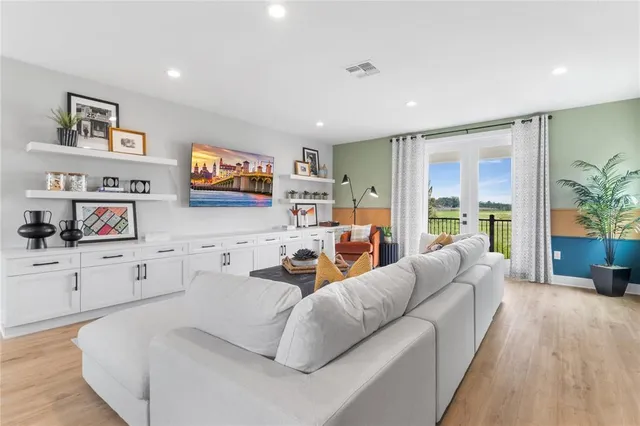 a bedroom with a bed and a table