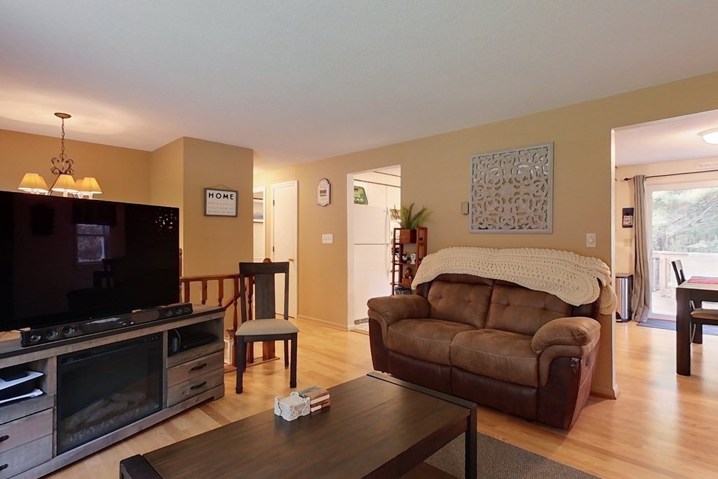 114 Walker Road Shirley, MA 01464 - Photo 11 of 34 a living room with furniture and a flat screen tv