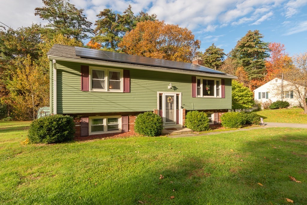 114 Walker Road Shirley, MA 01464 - Photo 26 of 34 a front view of a house with a yard