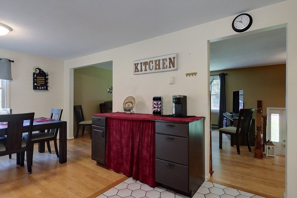 114 Walker Road Shirley, MA 01464 - Photo 6 of 34 a living room with furniture a desk and chair with wooden floor