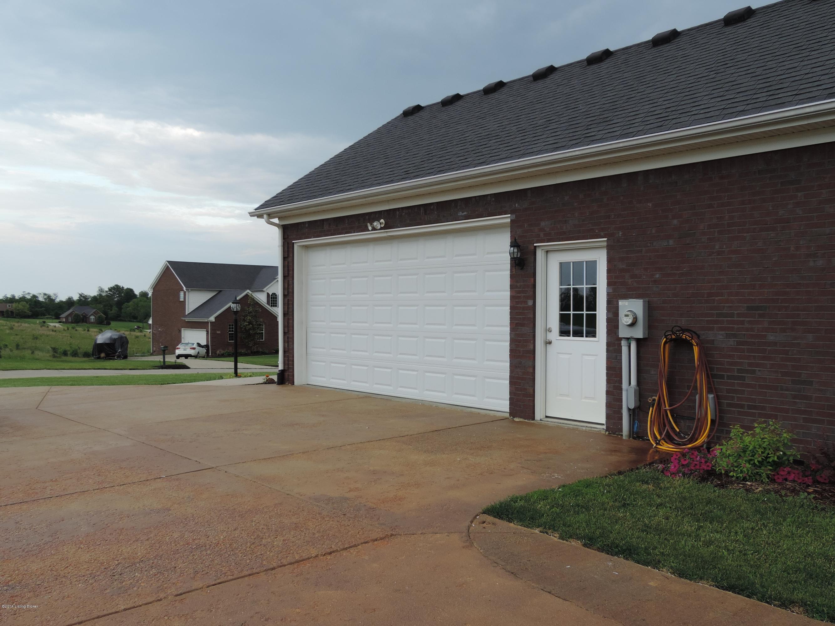 102 Jericho Ridge Court Smithfield, KY 40068 - Photo 24 of 27 This home has a concrete driveway that has an extra large parking pad.