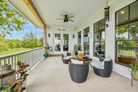 a view of a patio and garden