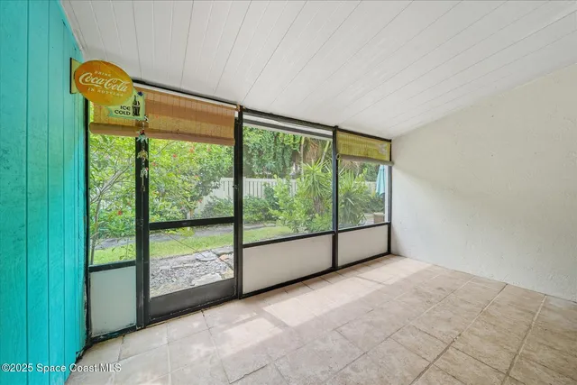 a view of a room with a large window