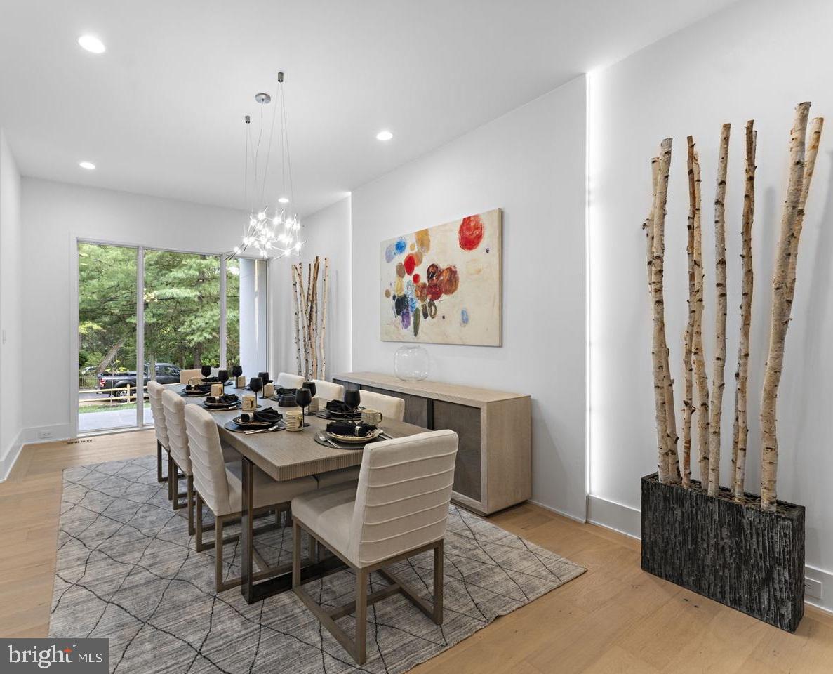 6330 Cross Street McLean, VA 22101 - Photo 4 of 19 a dining room with furniture and a large window